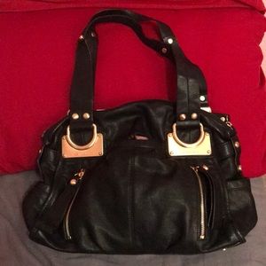 B. Makowsky black leather and gold purse